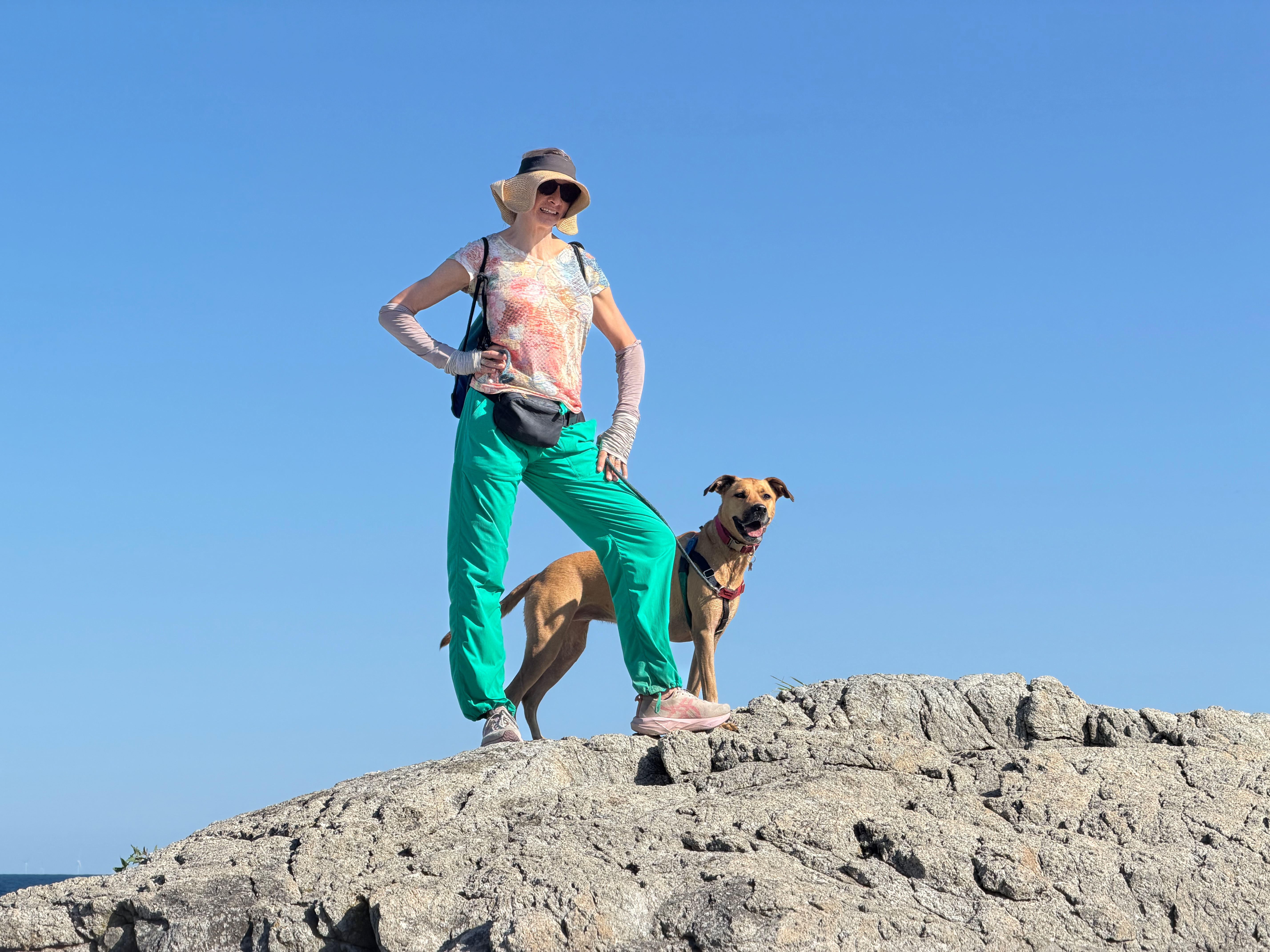 Leslie and Coco on a rock